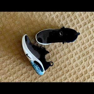 Nike womens joyride run black and white sneakers